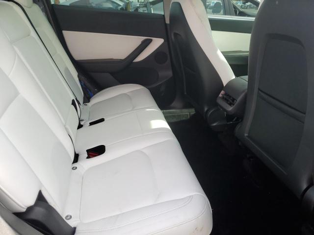 Photo 10 from auction – 2022 TESLA MODEL Y with VIN 7SAYGDEE0NF360021