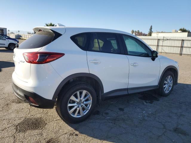 Photo 3 from auction – 2016 MAZDA CX-5 TOURI with VIN JM3KE2CY1G0689023