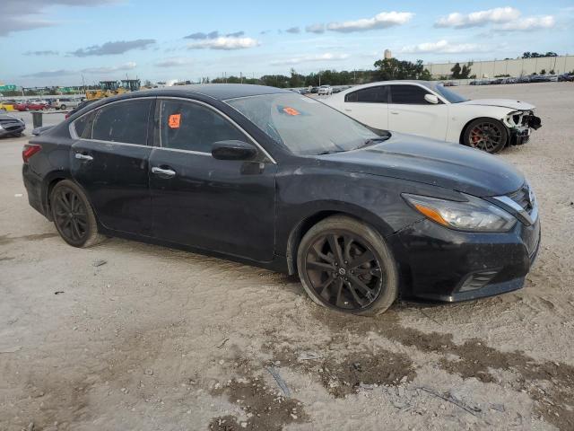 Photo 4 from auction – 2017 NISSAN ALTIMA 2.5 with VIN 1N4AL3AP2HC260747
