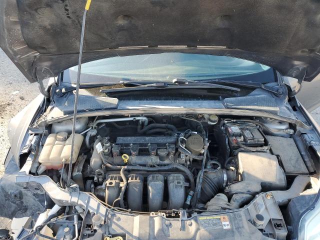 Photo 11 from auction – 2014 FORD FOCUS SE with VIN 1FADP3F24EL169635