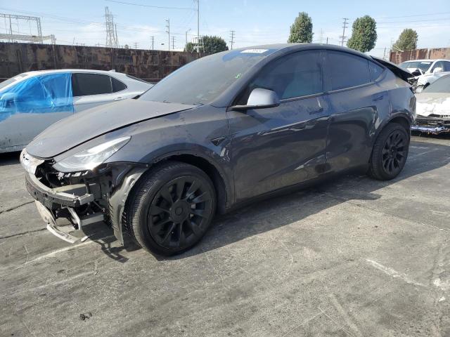 TESLA MODEL Y 2022 with VIN 7SAYGDEE0NF360021 - Photo from auction