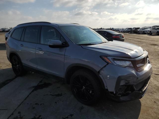 Photo 4 from auction – 2022 HONDA PILOT BLAC with VIN 5FNYF6H78NB047372