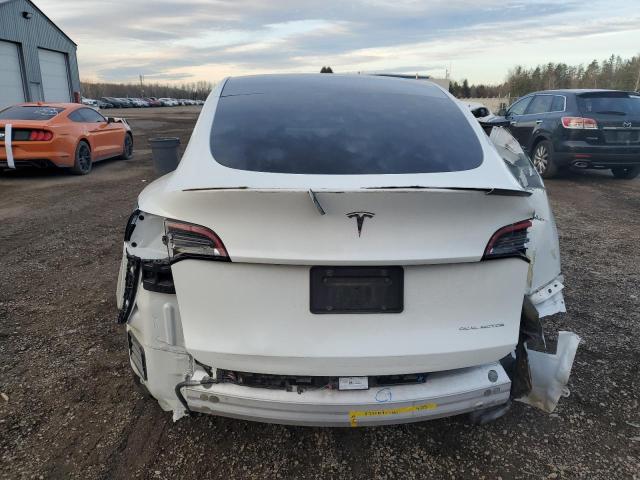 Photo 6 from auction – 2022 TESLA MODEL Y with VIN 7SAYGAEE3NF514817