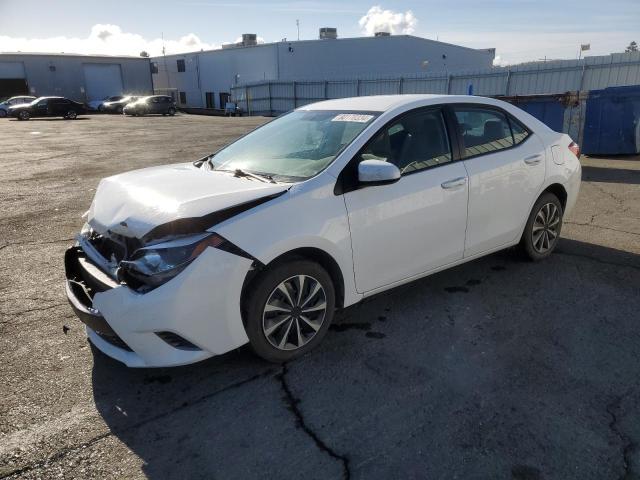 TOYOTA COROLLA L 2015 with VIN 5YFBURHE5FP303291 - Photo from auction