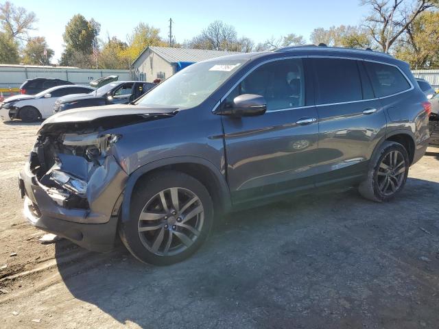 Photo 1 from auction – 2017 HONDA PILOT TOUR with VIN 5FNYF6H92HB073620