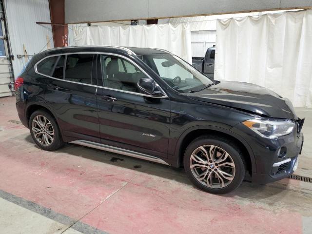 Photo 4 from auction – 2017 BMW X1 XDRIVE2 with VIN WBXHT3Z35H4A55644