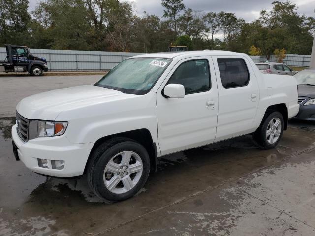 HONDA RIDGELINE 2014 with VIN 5FPYK1F53EB004842 - Photo from auction