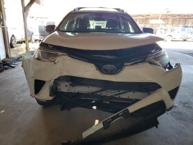 Photo 5 from auction – 2017 TOYOTA RAV4 LE with VIN JTMBFREV7HJ148815