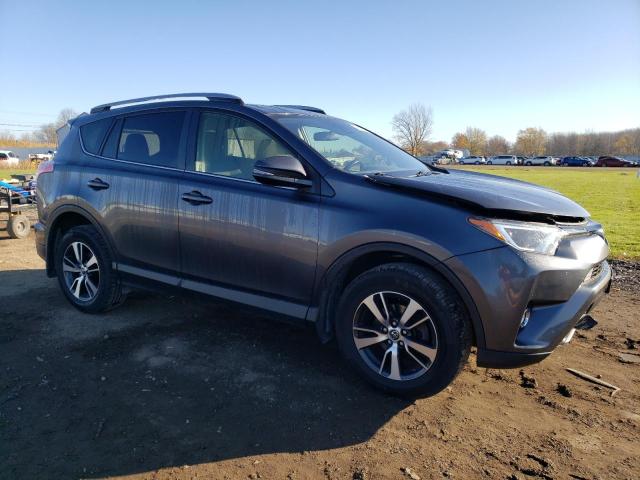 Photo 4 from auction – 2017 TOYOTA RAV4 XLE with VIN JTMRFREV2HD212207