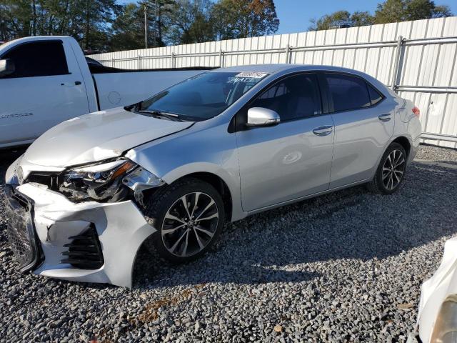 TOYOTA COROLLA L 2018 with VIN 5YFBURHE9JP799611 - Photo from auction