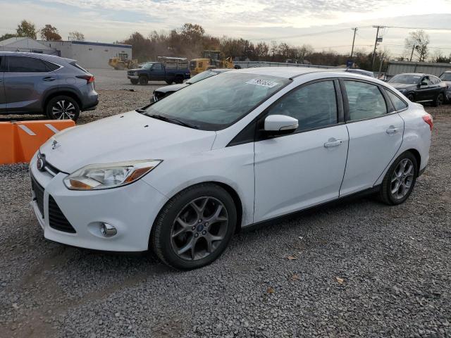 FORD FOCUS SE 2014 with VIN 1FADP3F21EL143252 - Photo from auction
