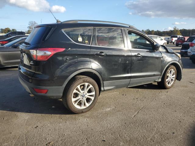 Photo 3 from auction – 2018 FORD ESCAPE SE with VIN 1FMCU9GD1JUC57852