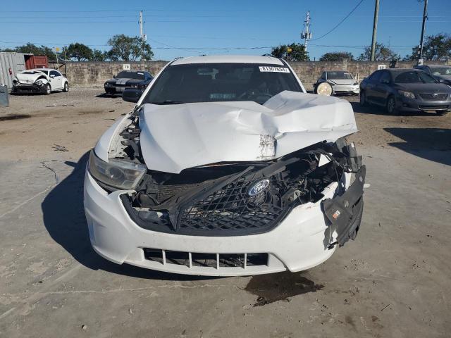 Photo 5 from auction – 2013 FORD TAURUS POL with VIN 1FAHP2L88DG139002