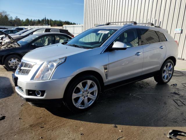 CADILLAC SRX PERFOR 2011 with VIN 3GYFNEEY8BS670456 - Photo from auction