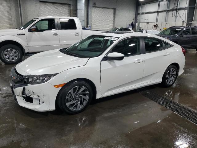 HONDA CIVIC EX 2018 with VIN 19XFC2F77JE034334 - Photo from auction
