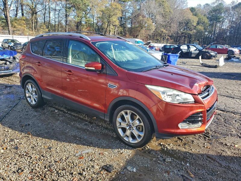 Photo 4 from auction – 2015 FORD ESCAPE TIT with VIN 1FMCU0J90FUC85990
