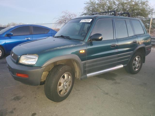 TOYOTA RAV4 1996 with VIN JT3HP10VXT7009577 - Photo from auction