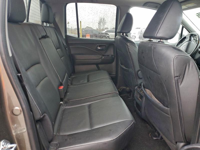 Photo 10 from auction – 2023 HONDA RIDGELINE with VIN 5FPYK3F74PB007135