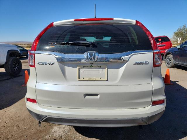 Photo 6 from auction – 2016 HONDA CR-V LX with VIN 5J6RM4H39GL106029