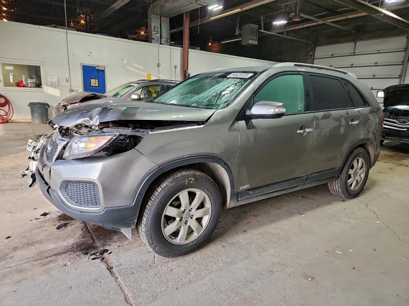 KIA SORENTO LX 2013 with VIN 5XYKTDA26DG348716 - Photo from auction