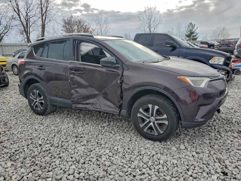Photo 4 from auction – 2016 TOYOTA RAV4 LE with VIN 2T3BFREV2GW470424
