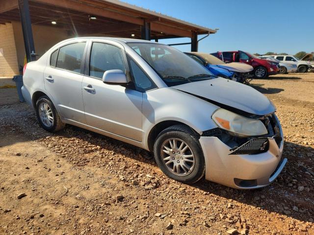 Photo 4 from auction – 2012 SUZUKI SX4 LE with VIN JS2YC5A39C6304905