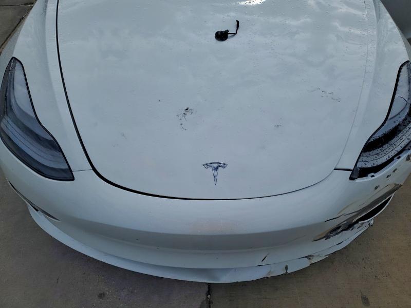 Photo 11 from auction – 2023 TESLA MODEL 3 with VIN 5YJ3E1EC6PF619804