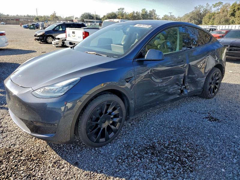 TESLA MODEL Y 2023 with VIN 7SAYGDEE4PA044931 - Photo from auction