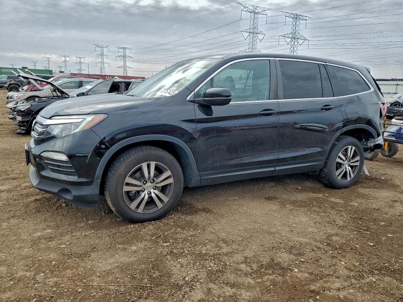 HONDA PILOT EXL 2016 with VIN 5FNYF6H59GB104616 - Photo from auction