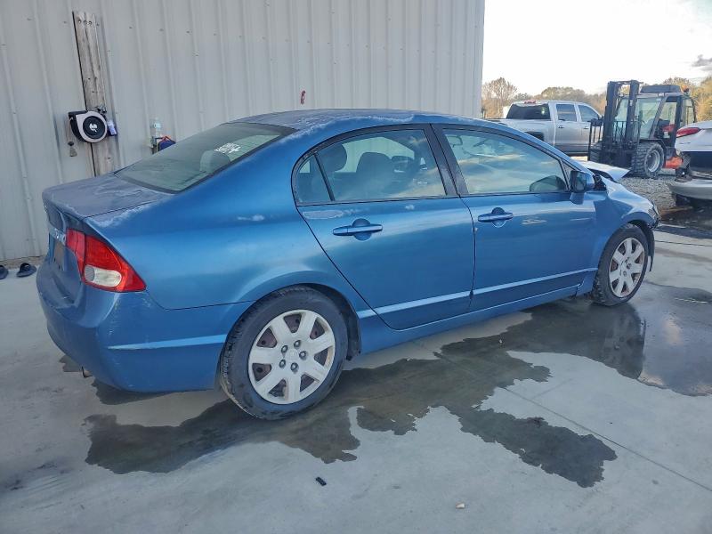 Photo 3 from auction – 2011 HONDA CIVIC LX with VIN 2HGFA1F56BH527086