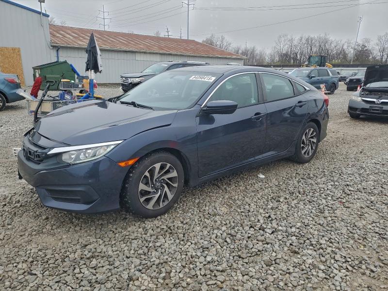 HONDA CIVIC EX 2018 with VIN 2HGFC2F74JH579283 - Photo from auction