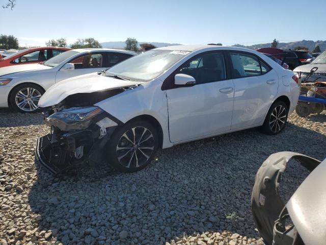 TOYOTA COROLLA L 2019 with VIN 2T1BURHE5KC206490 - Photo from auction