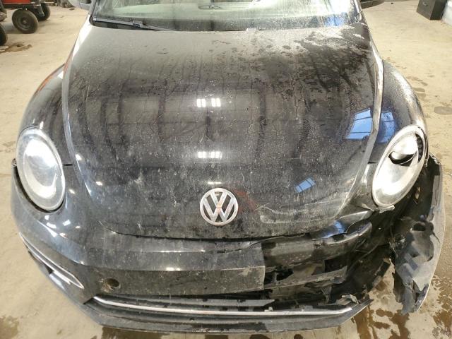 Photo 11 from auction – 2018 VOLKSWAGEN BEETLE with VIN 3VW5DAAT9JM517589