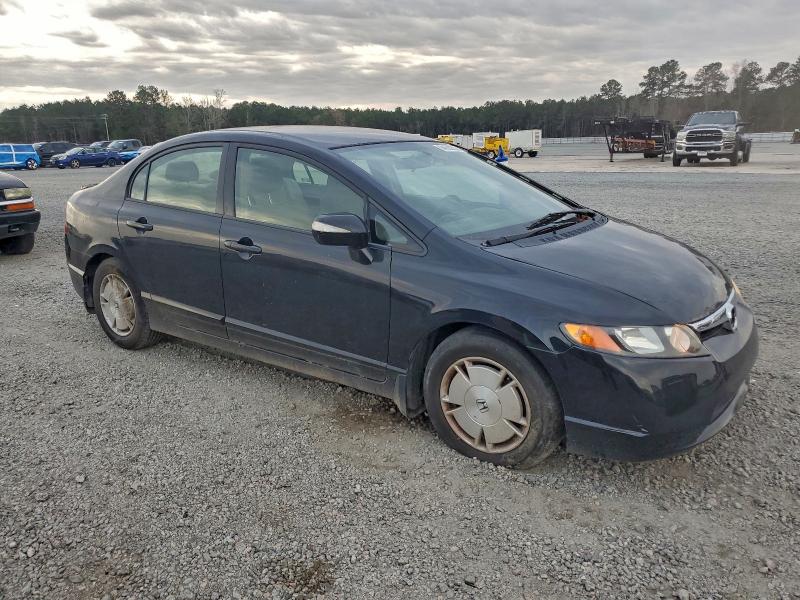 Photo 4 from auction – 2011 HONDA CIVIC HYBR with VIN JHMFA3F20BS000006