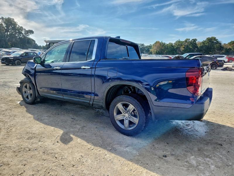 Photo 2 from auction – 2023 HONDA RIDGELINE with VIN 5FPYK3F75PB027068