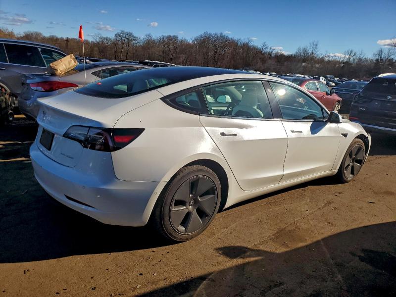 Photo 3 from auction – 2021 TESLA MODEL 3 with VIN 5YJ3E1EB9MF020141