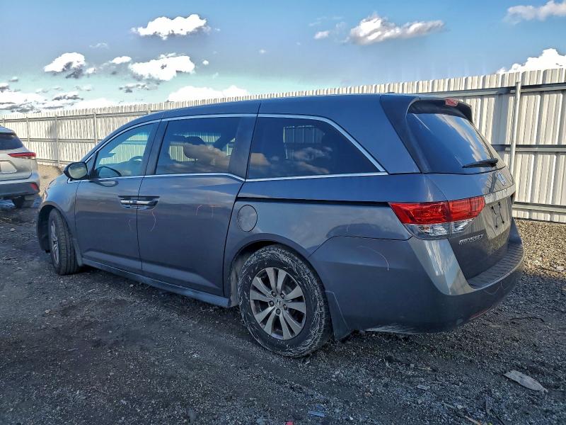Photo 2 from auction – 2016 HONDA ODYSSEY SE with VIN 5FNRL5H33GB006753
