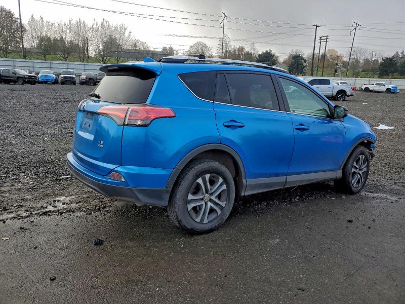 Photo 3 from auction – 2016 TOYOTA RAV4 LE with VIN 2T3BFREV4GW532728