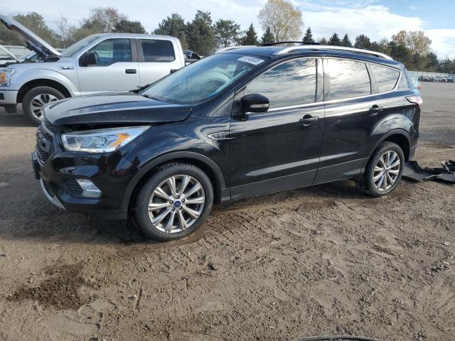 Photo 1 from auction – 2017 FORD ESCAPE TIT with VIN 1FMCU0J98HUF03242