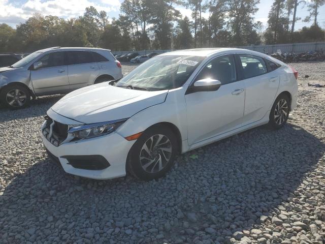 HONDA CIVIC EX 2018 with VIN 19XFC2F78JE032172 - Photo from auction