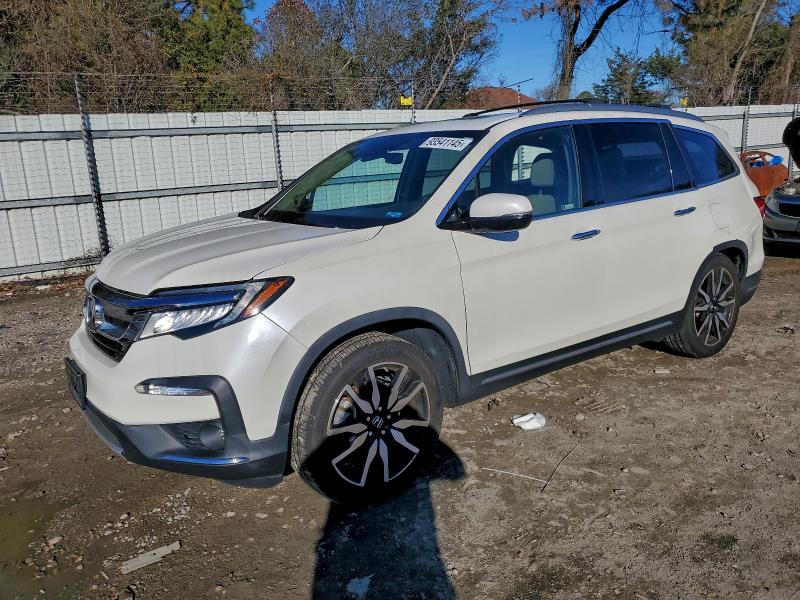 HONDA PILOT ELIT 2019 with VIN 5FNYF6H02KB026676 - Photo from auction
