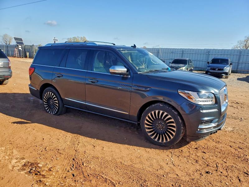 Photo 4 from auction – 2021 LINCOLN NAVIGATOR with VIN 5LMJJ2TT4MEL06204