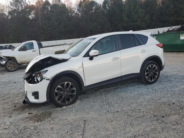MAZDA CX-5 GT 2016 with VIN JM3KE2DYXG0650185 - Photo from auction