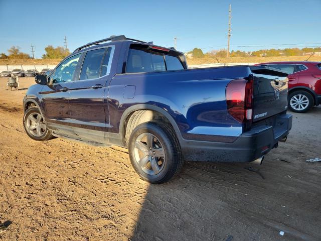 Photo 2 from auction – 2021 HONDA RIDGELINE with VIN 5FPYK3F50MB027196