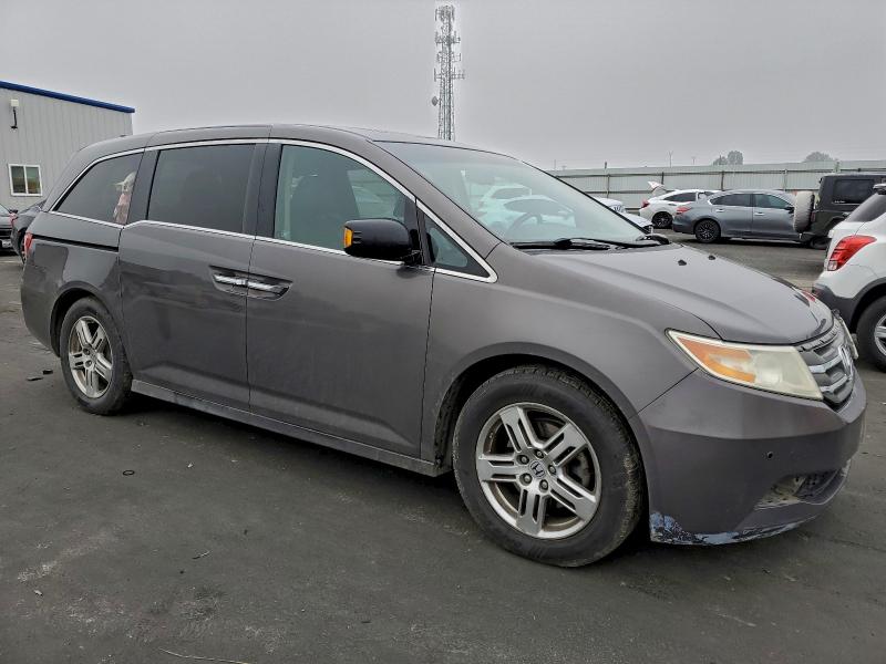 Photo 4 from auction – 2012 HONDA ODYSSEY TO with VIN 5FNRL5H94CB031823