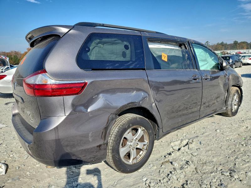 Photo 3 from auction – 2016 TOYOTA SIENNA LE with VIN 5TDKK3DC9GS726407