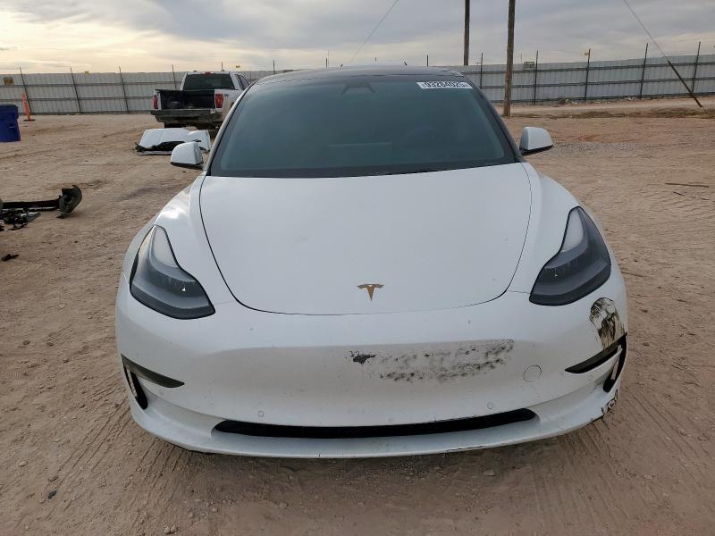 Photo 5 from auction – 2021 TESLA MODEL 3 with VIN 5YJ3E1EA3MF100736