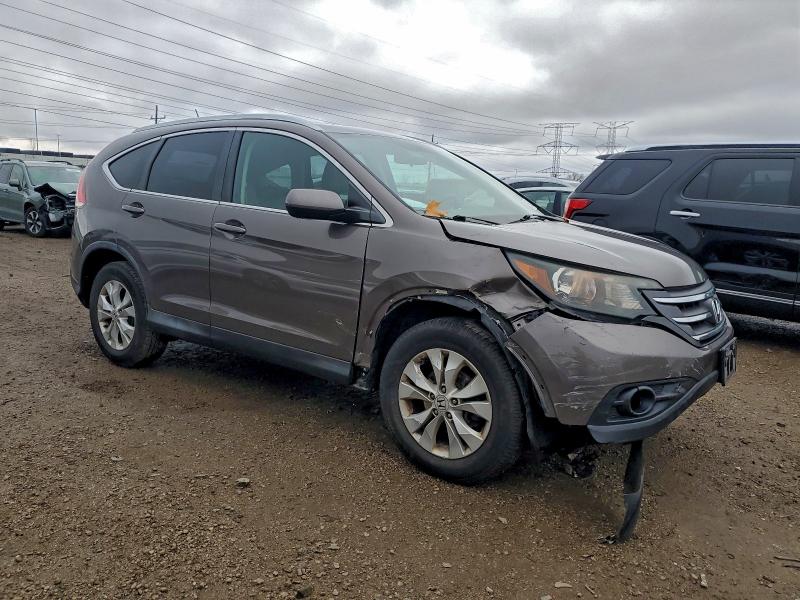 Photo 4 from auction – 2014 HONDA CR-V EXL with VIN 2HKRM4H74EH716852