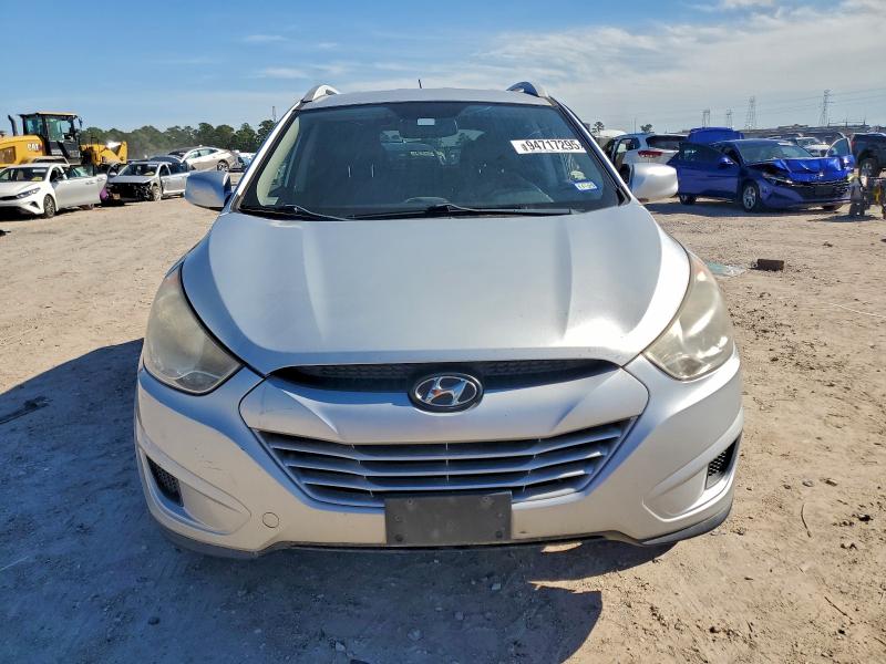 Photo 5 from auction – 2011 HYUNDAI TUCSON with VIN KM8JU3AC0BU279198