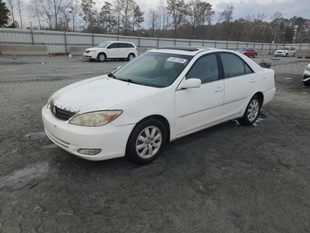 TOYOTA CAMRY LE 2004 with VIN 4T1BF30K34U073724 - Photo from auction